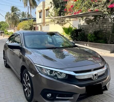 Honda civic i-vtec oriel sunroof ug new meter Karachi